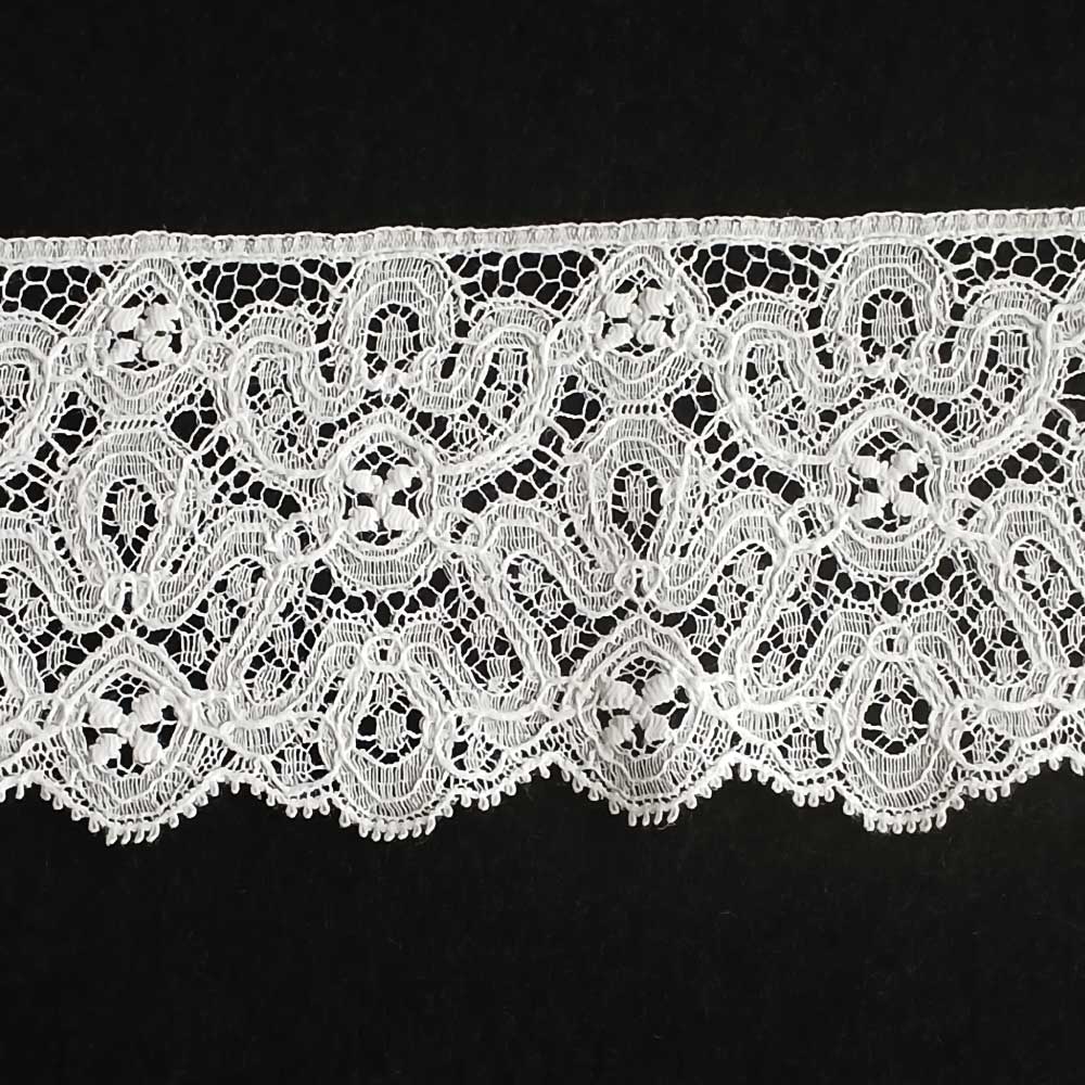 Close-up of Stuart-era Milanese lace trim with intricate floral design